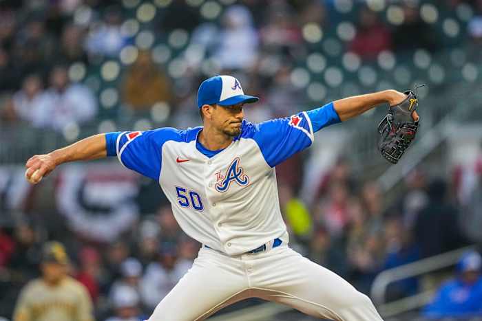 Apr 8, 2023; Cumberland, Georgia, USA; Atlanta Braves starting pitcher Charlie Morton (50) pitches against the San Diego Padres during the first inning at Truist Park.